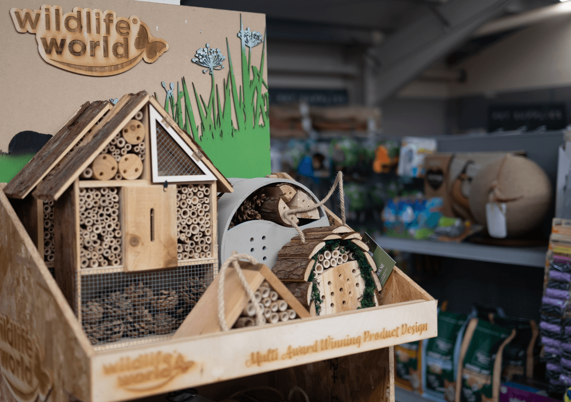 Insect and bug houses on display in the garden centre